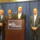 Michigan Attorney General Mike Schuette at a press conference this morning. Image via screenshot/The Detroit News.